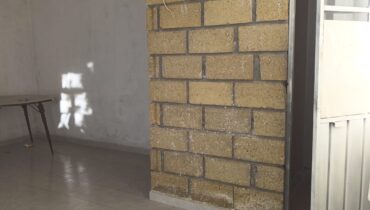 CASA EN VENTA  CON 9 CUARTOS INDEPENDIENTES PARA RENTAR .